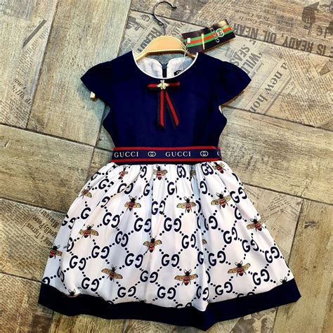 infant girl gucci dresses.